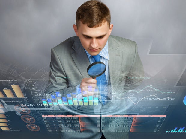 predictive model data user magnifying glass graphs man