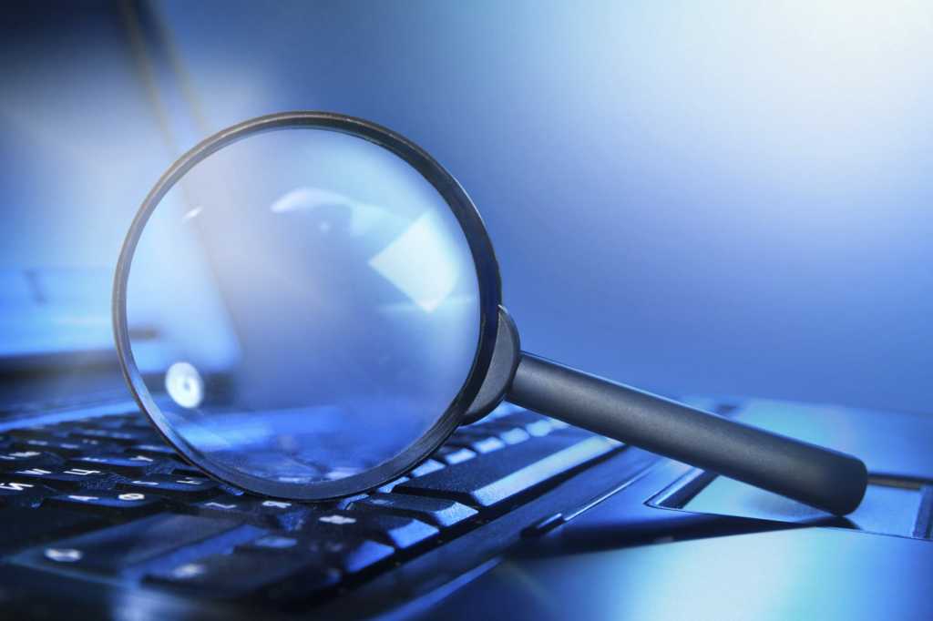 Magnifying glass on keyboard