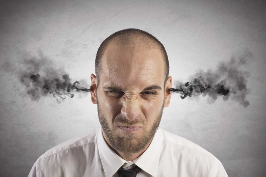 Man with steam coming out of ears angry frustrated mad