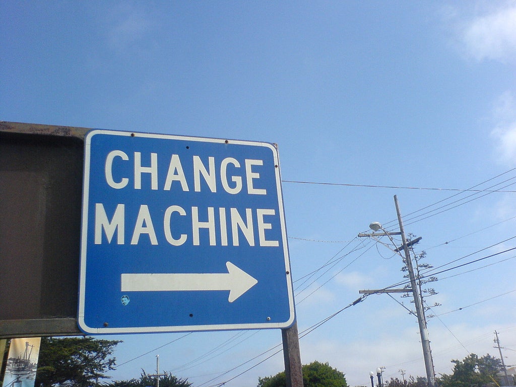 change machine sign arrow