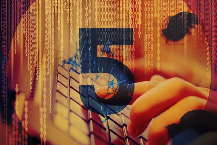 code raining down on keyboard with hand typing