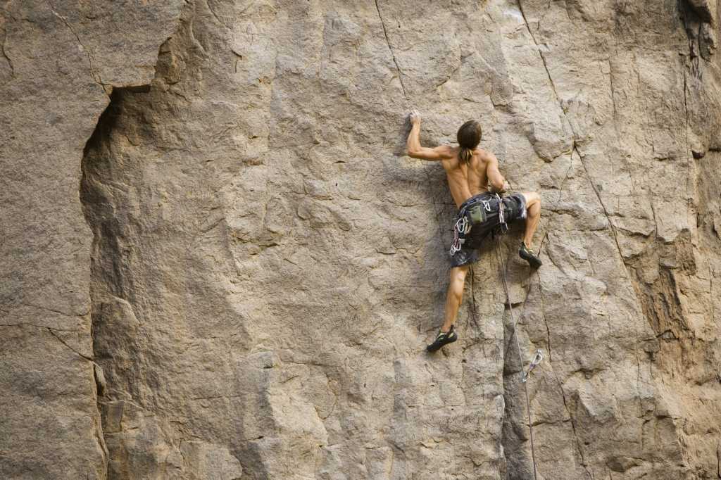 Rock climber bouldering    78807326