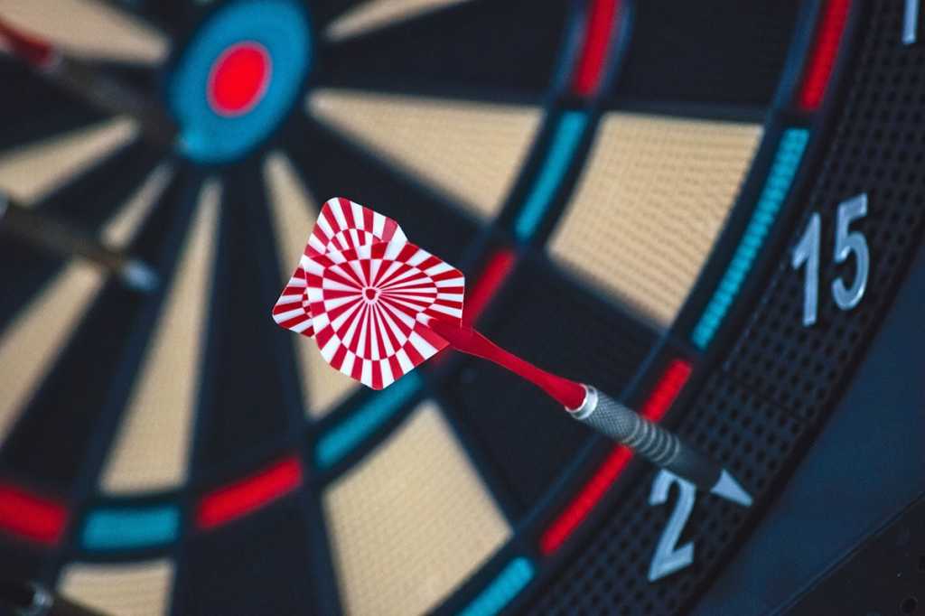 accuracy - dart on the outer edge of the dart board