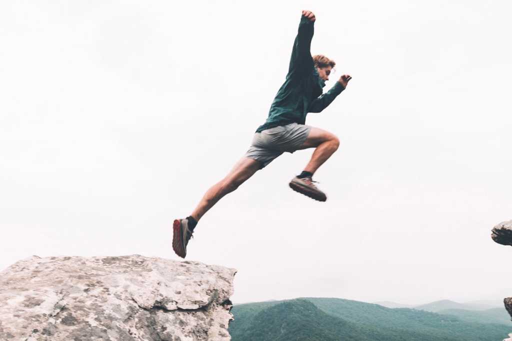 agile jump gap bridge the gap risk management by blake cheek unsplash