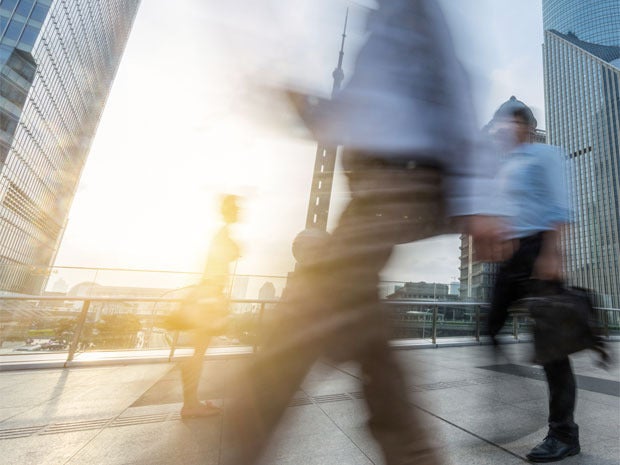 mobile workers blur walking business city