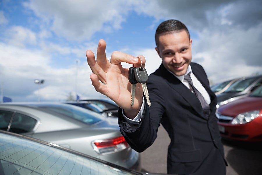 car salesman auto dealer keys