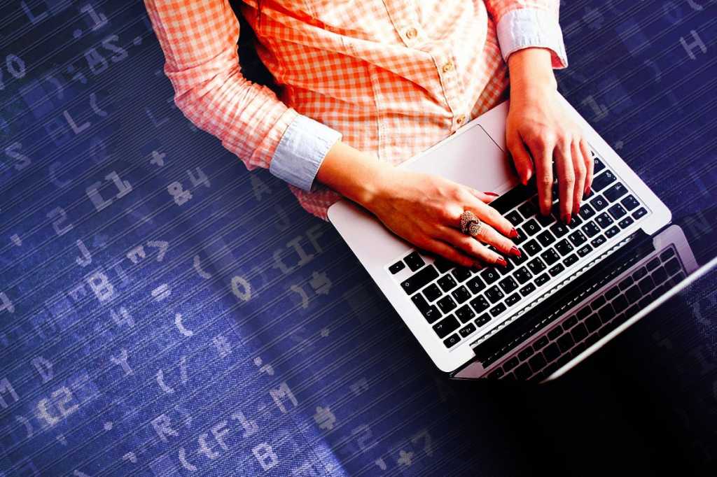 certification woman on laptop programmer devops data scientist by picjumbo