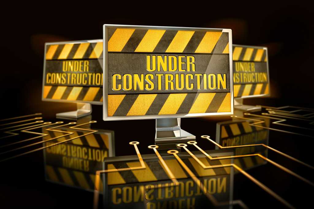 Circuits lead to signs that read, 'Under Construction.'