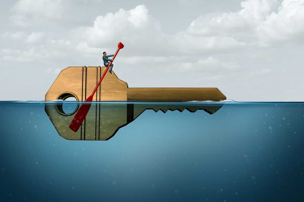 businessman paddles through deep waters on a key