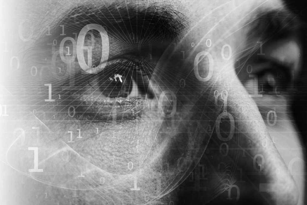 data scientist face in profile with binary numbers analystics