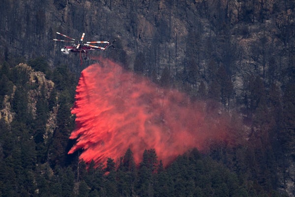 helicopter drops fire retardant rescue emergency