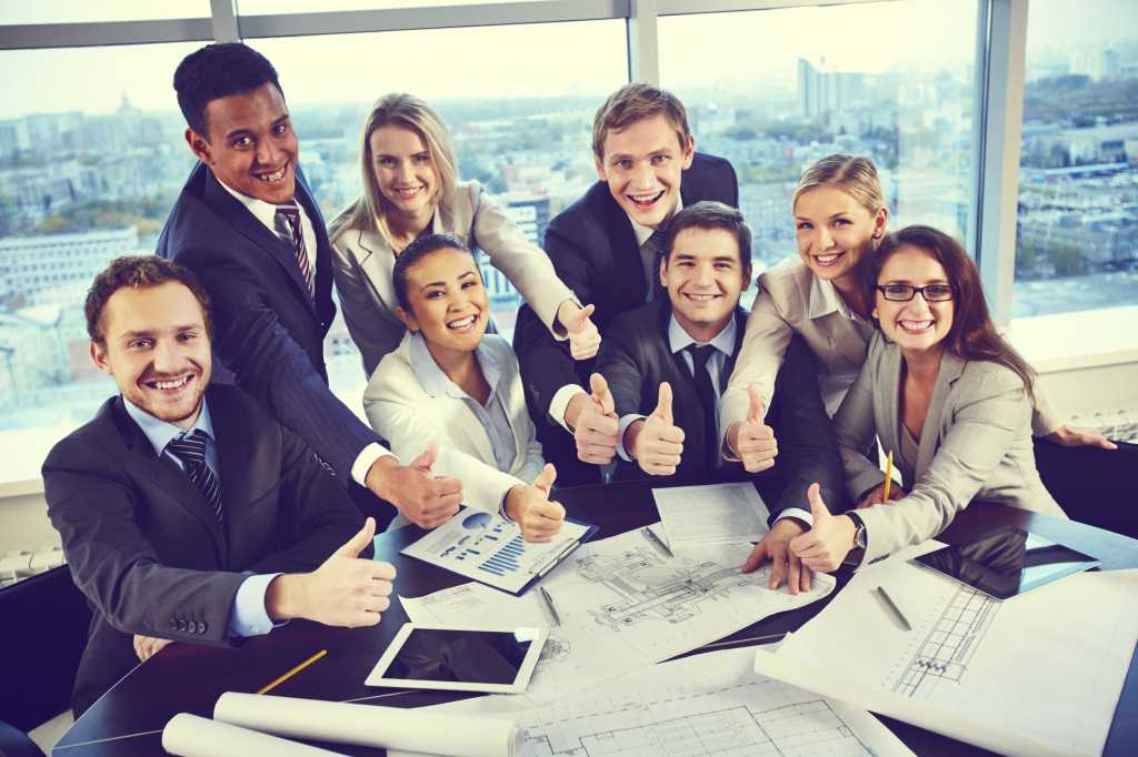 happy workers group men women thumbs-up
