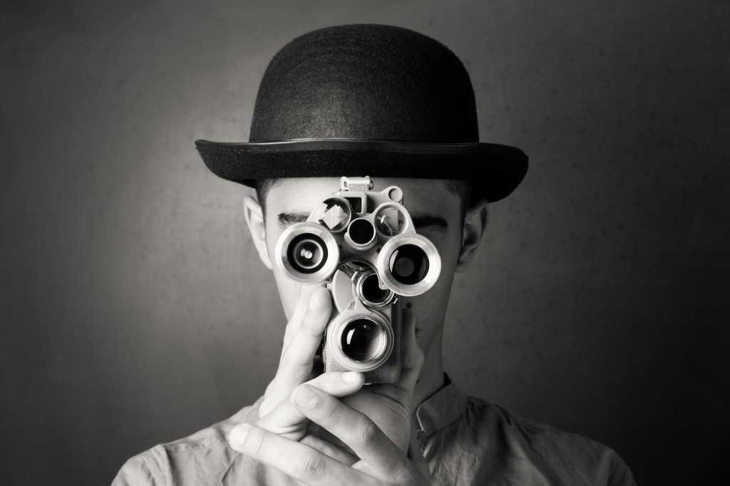 man looking through binocs spy hacker breach infiltrate gettyimages 164644457 by selimaksan 2400x16