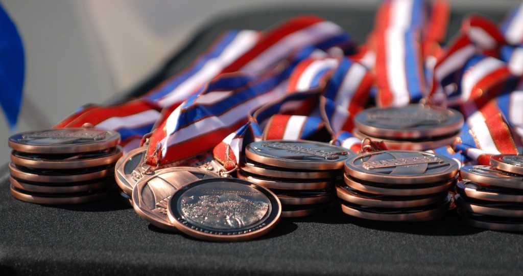 medals winners accolades winning prizes