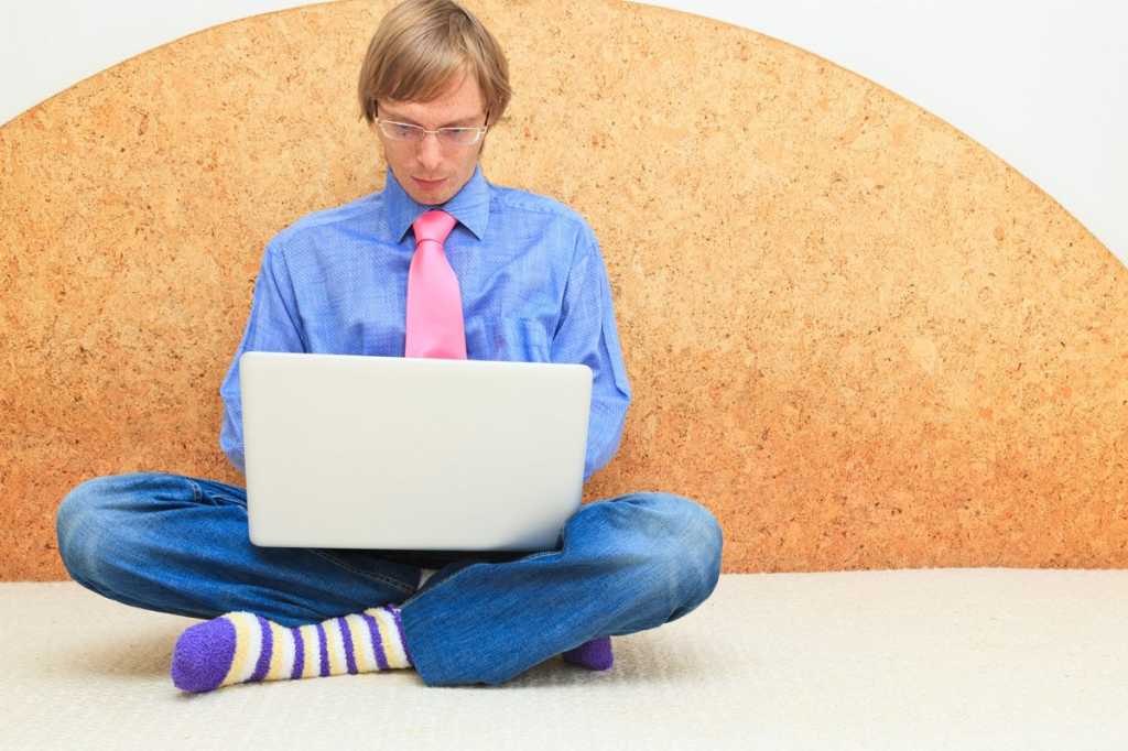 millennial working from home laptop remote employee worker programmer developer