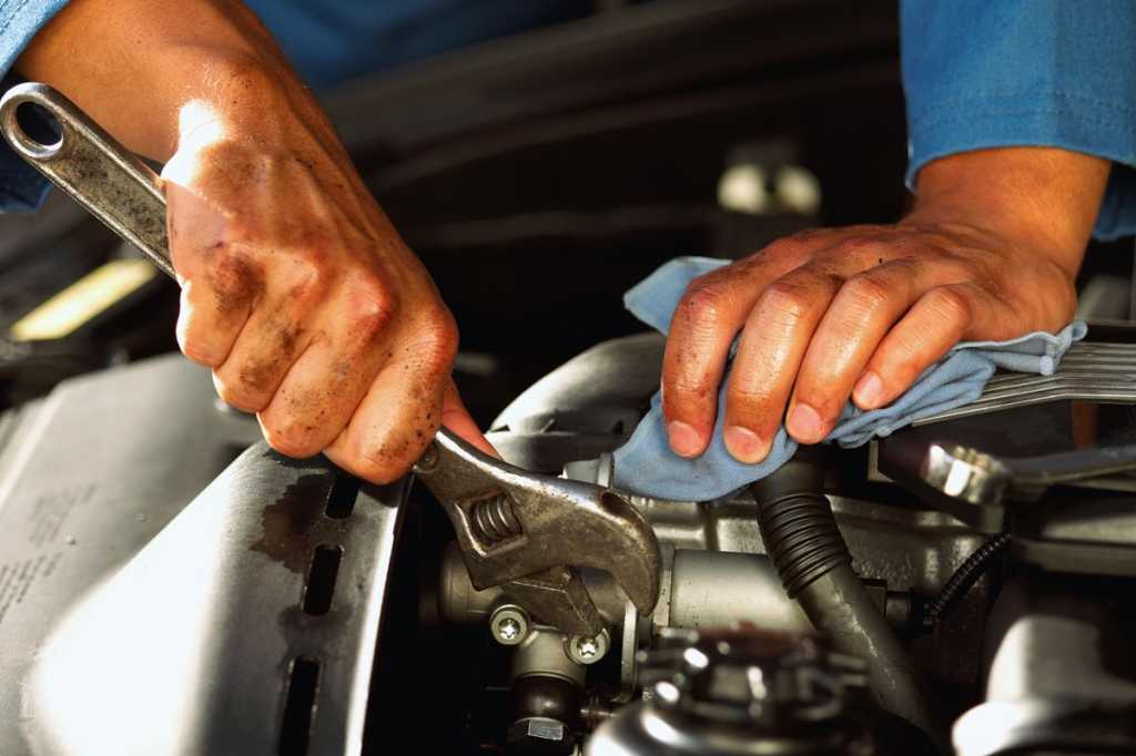 mechanic overhauling engine