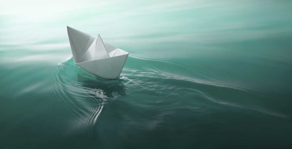 paper boat sailing 154996543