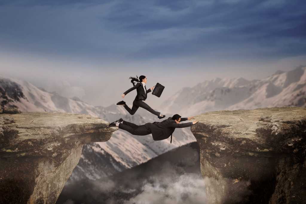 partners bridge gap / problem / challenge as a team