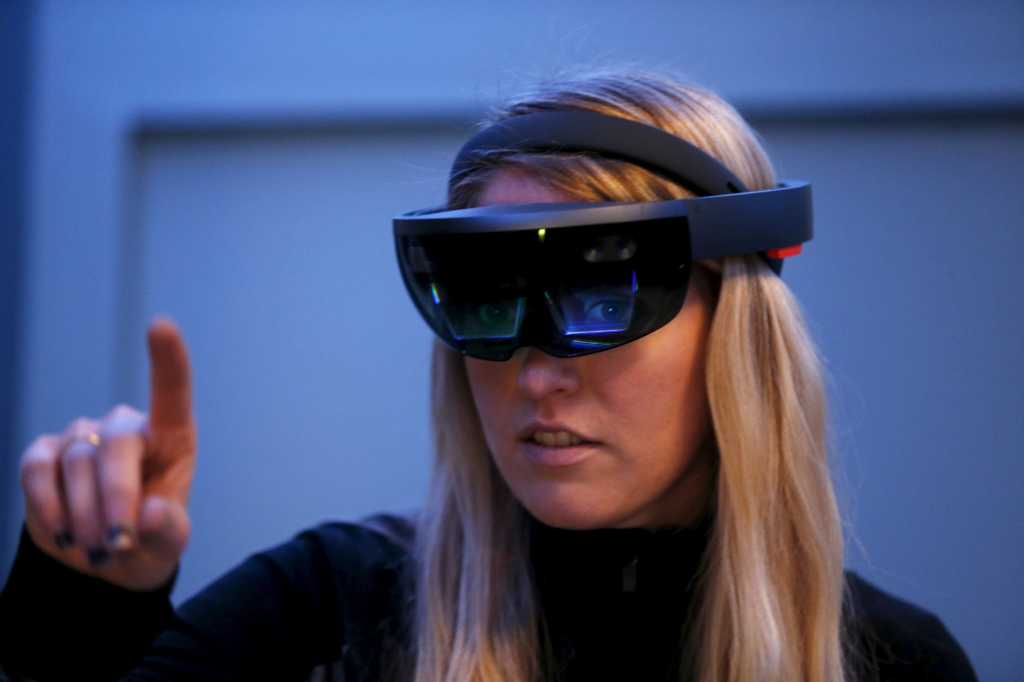 Microsoft hololens virtual reality glasses worn by woman