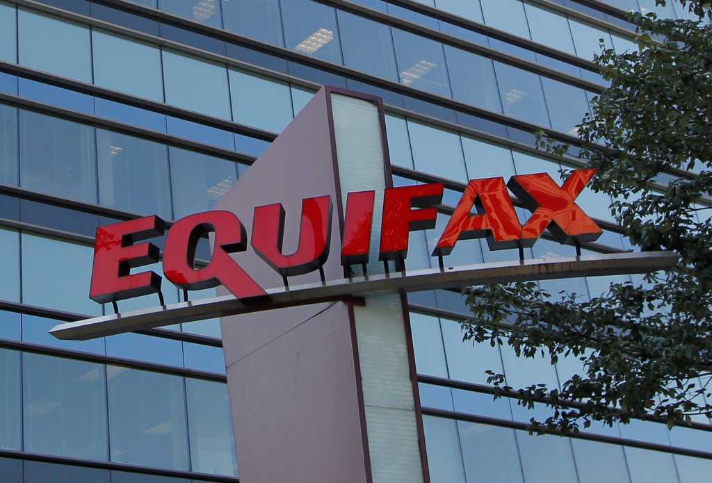 Equifax credit bureau logo and building security breach