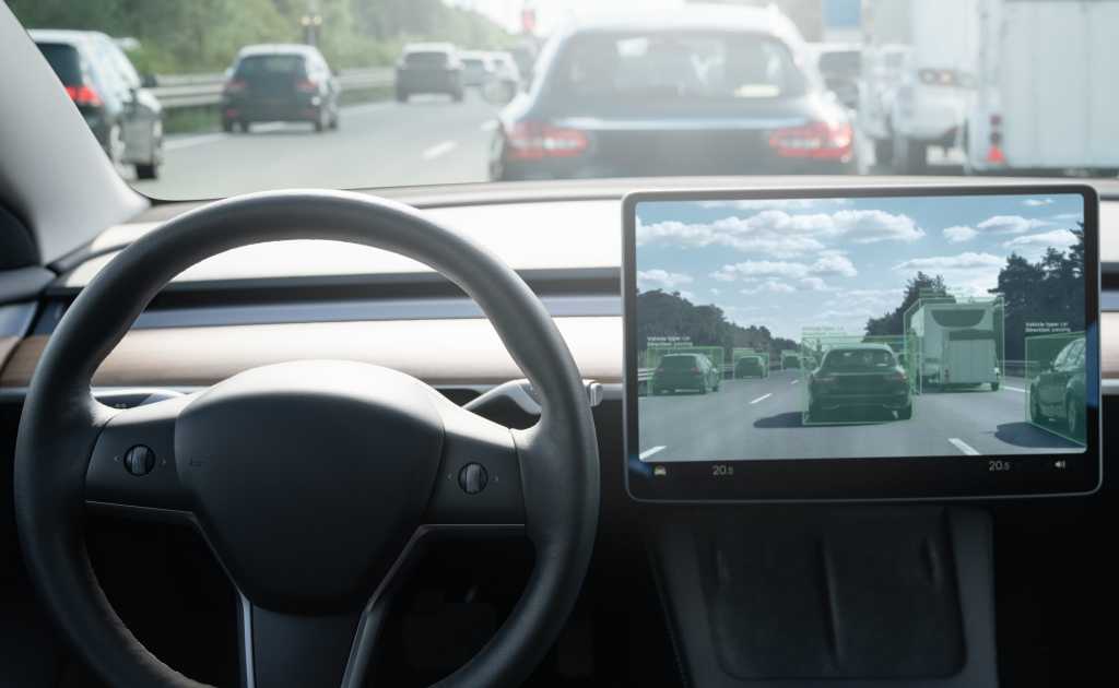 shutterstock 2281315585 inside view of self driving car on a road. Autonomous vehicle.