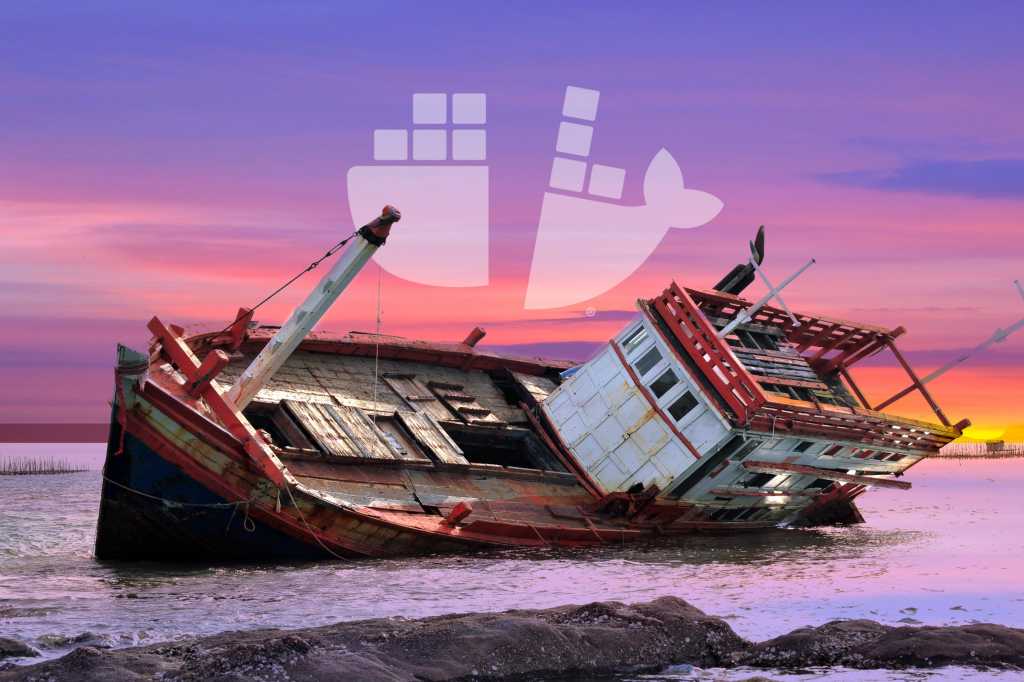 sinking cargo ship docker storage colorful shipping containers by tom.ruethai shutterstock 202572958