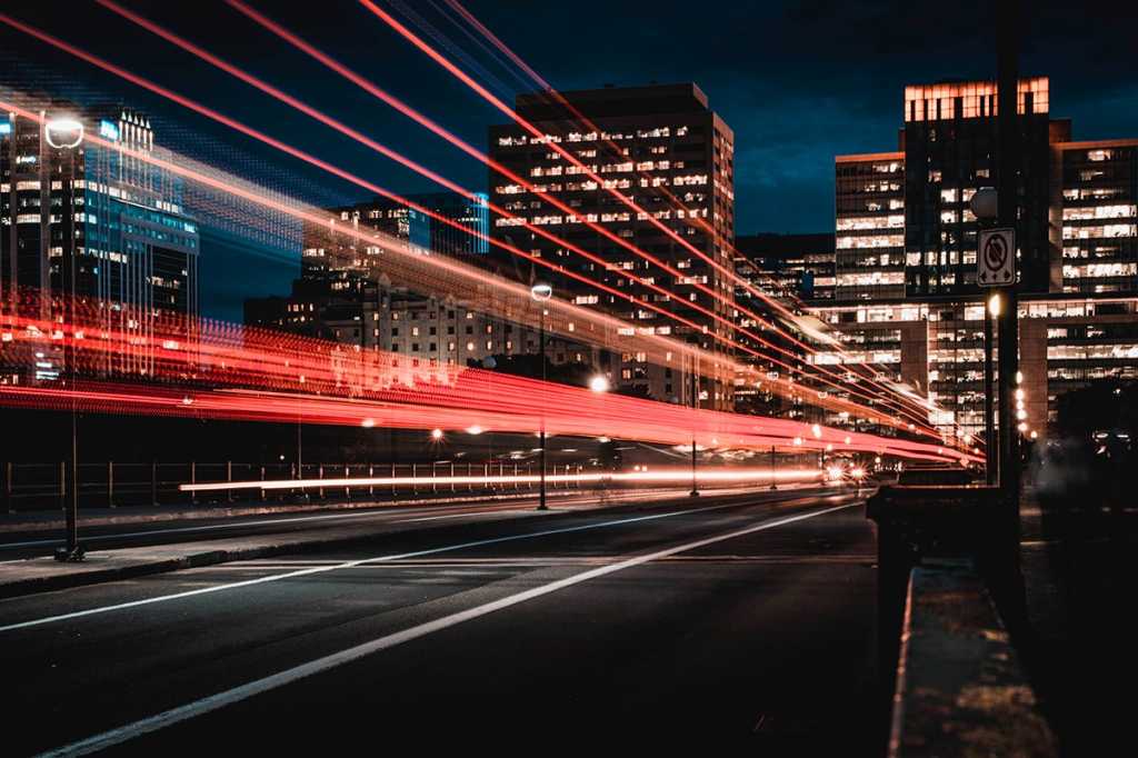 speed: light trails along a city street at night