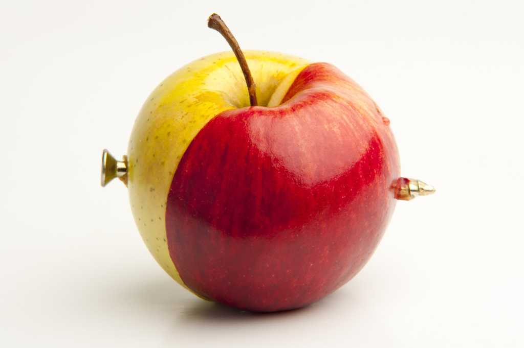 spliced together two different apples 135925055