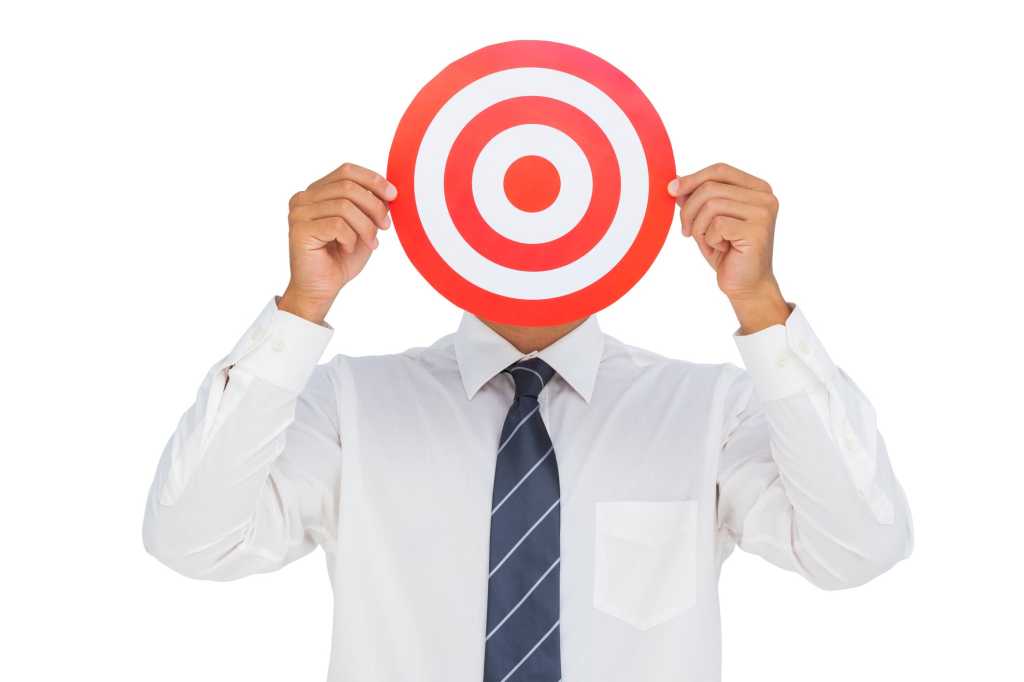 Man with bullseye target over face