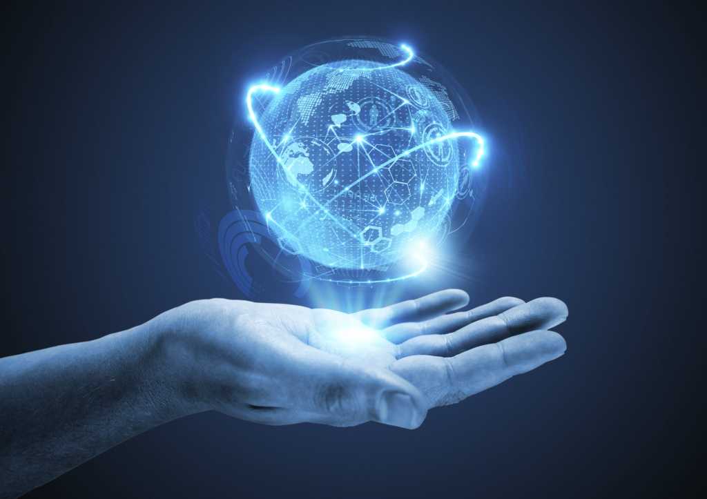 hands with floating virtual globe