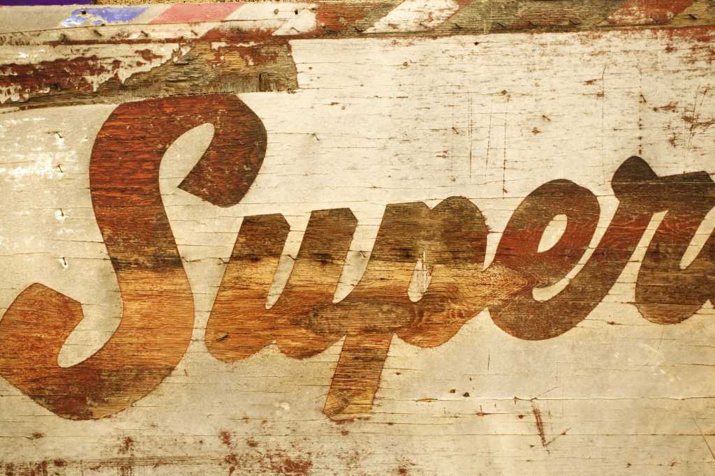Grunge Sign with the word "super" on it