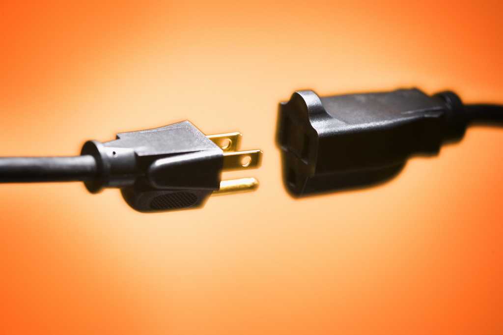black plugs on orange background unplugged