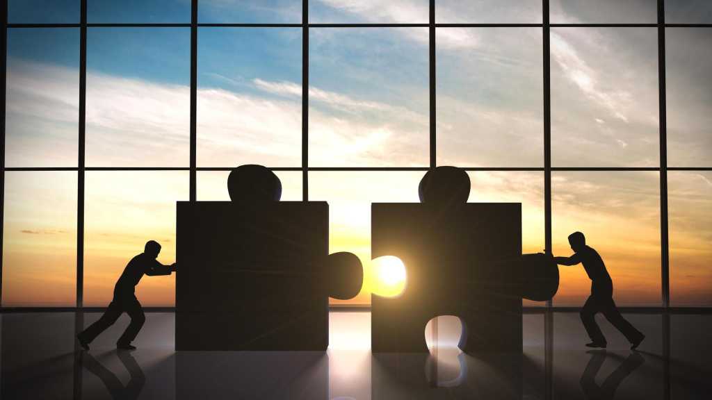 Business teamwork puzzle pieces.