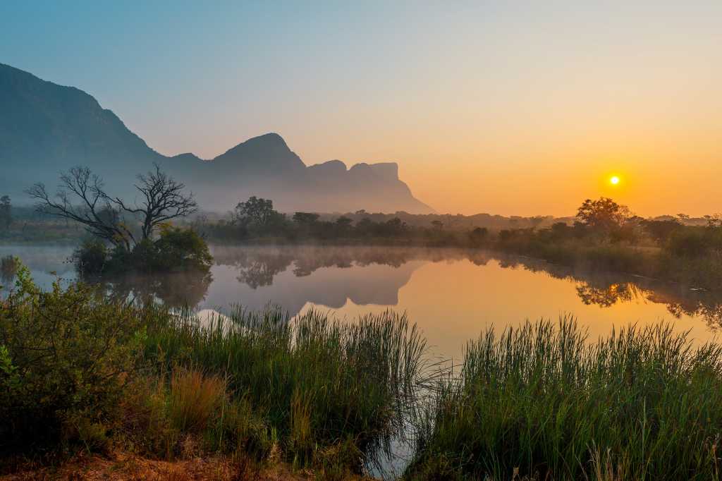 Africa  >  South Africa  >  Entabeni Game Reserve / sunrise / Hanglip mountain reflection in lake