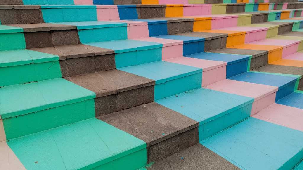Outdoor stairs steps painted with colorful lines