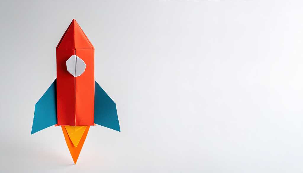 Ready for takeoff. A red and blue origami rocket ship poised for takeoff.