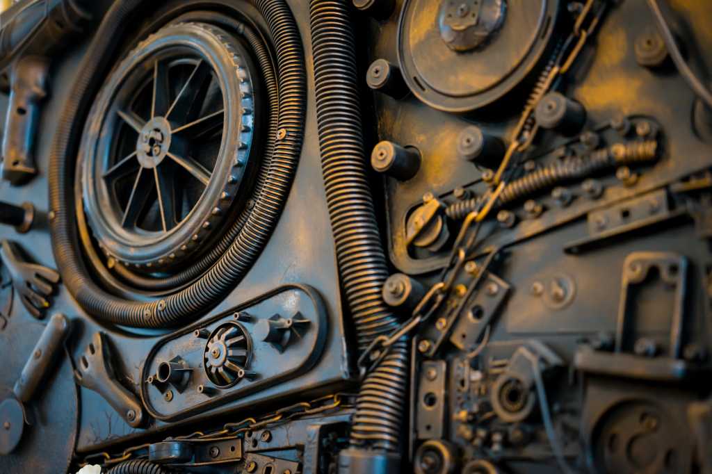 Cogs and gears in a steampunk machine; mechanical theme, how things work.