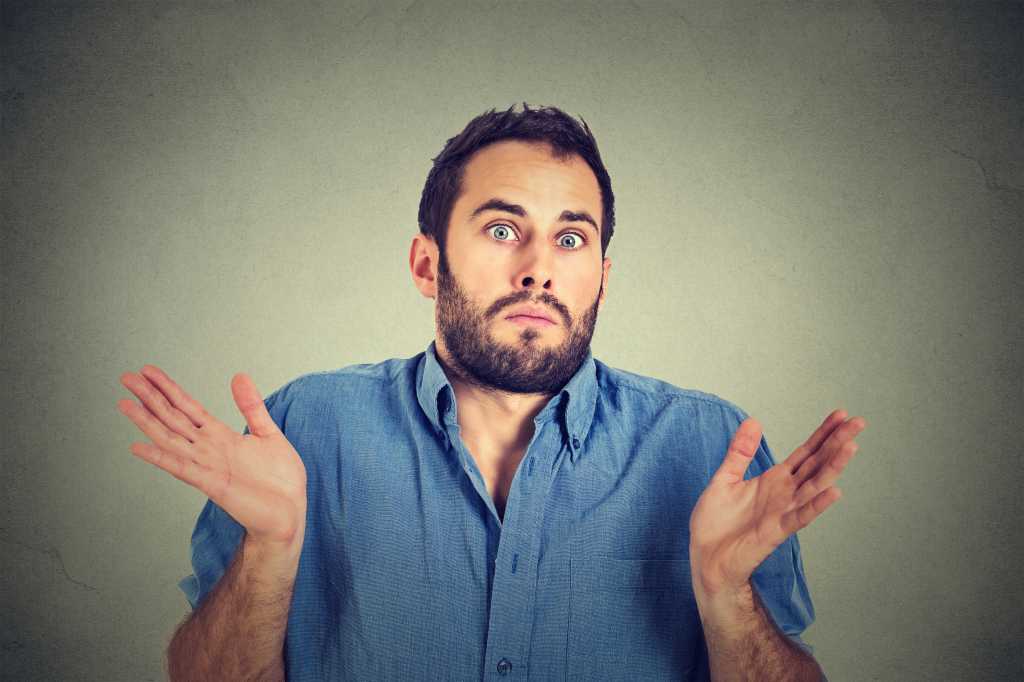 Man looking confused or giving up