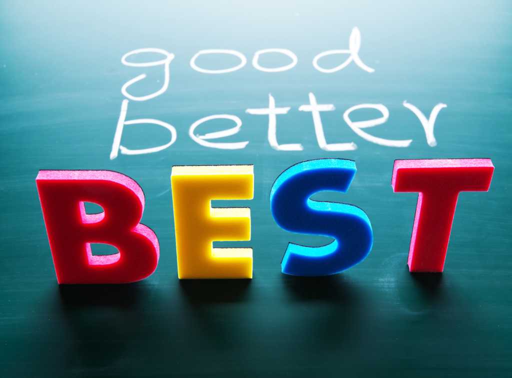 The words "good, better, best" in colorful letters on a chalkboard background.