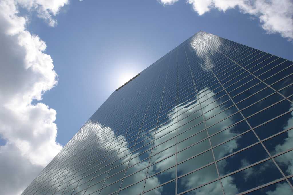reflection of clouds on high rise building