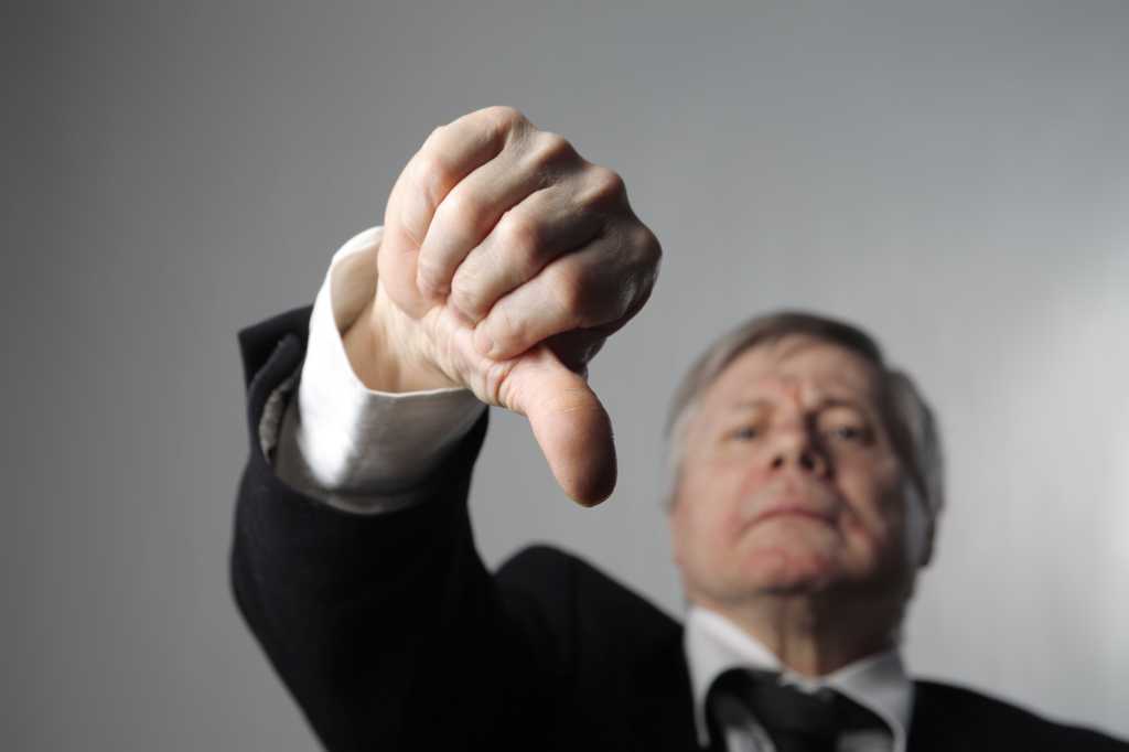 shutterstock 26147695 a businessman with thumbs down boss