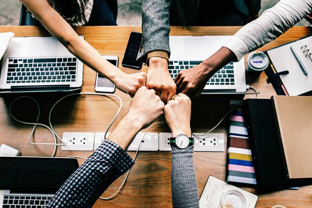 teamwork / fist bump / collaboration