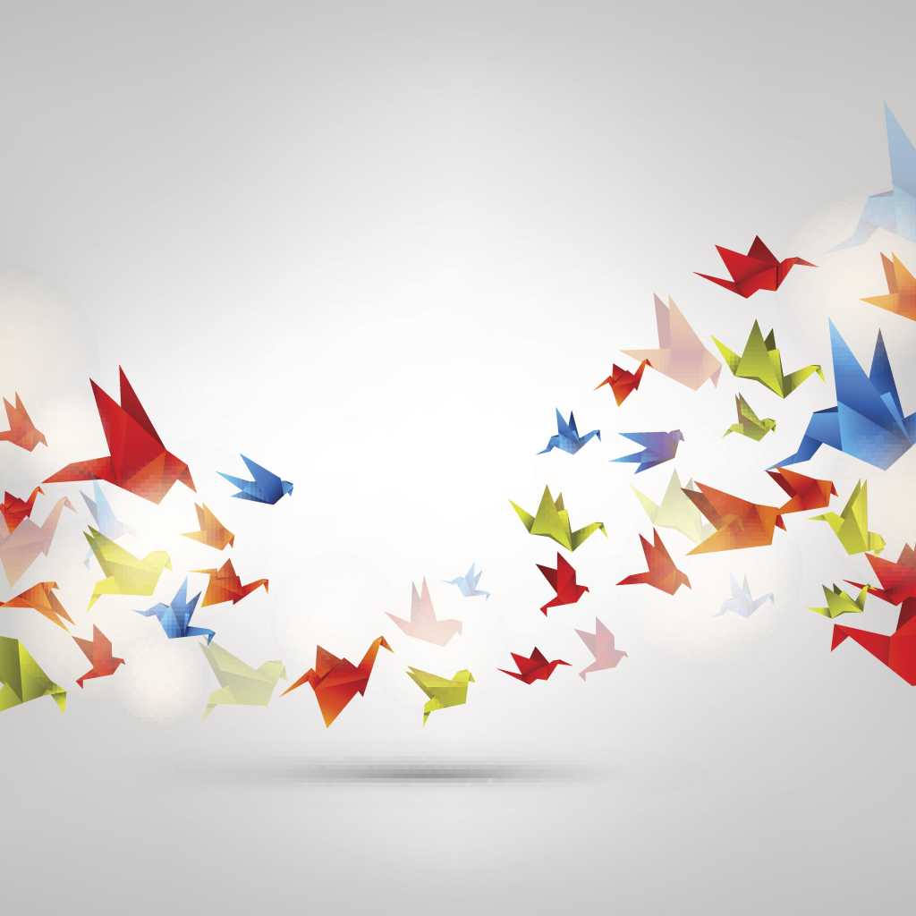 colorful origami birds in flight