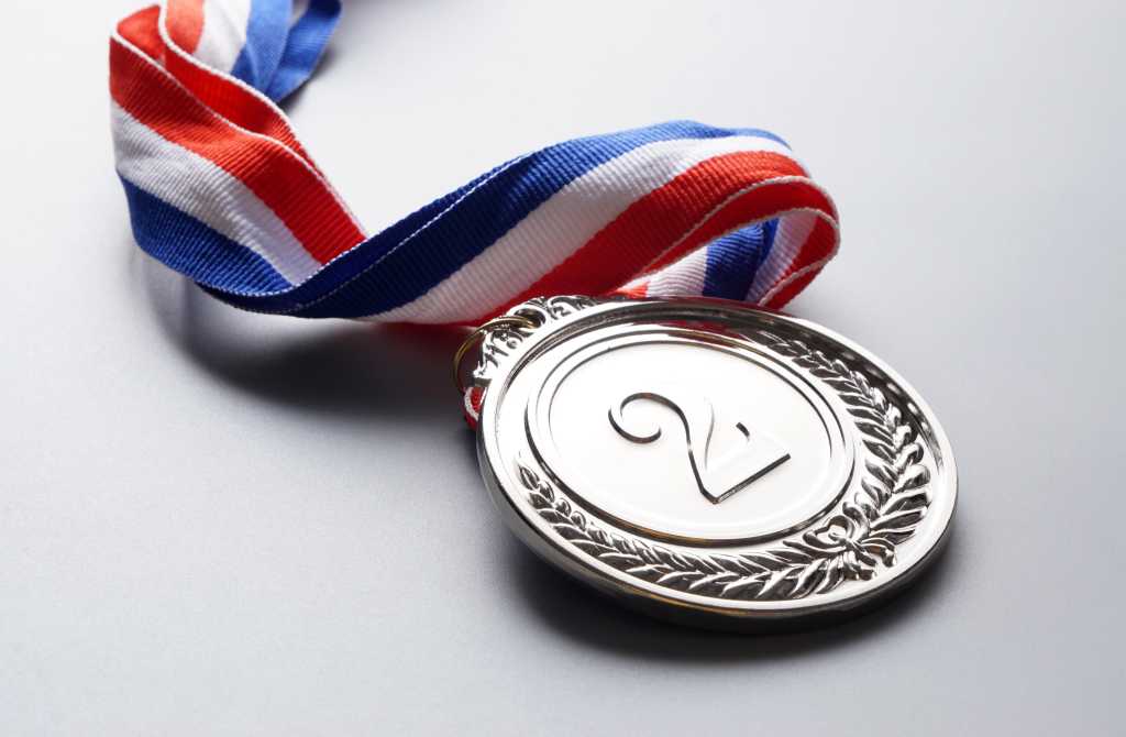 Silver medal on gray background. Second place. 2nd place. Good not great.