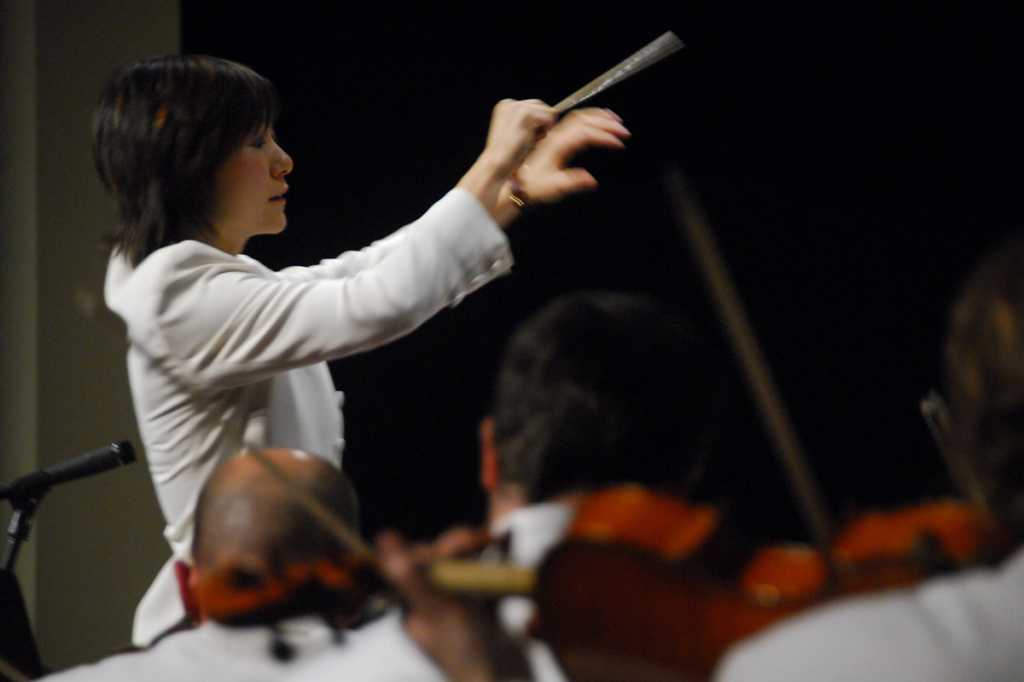 woman conductor music F#